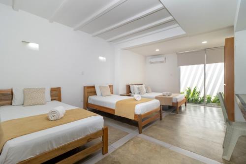 Hotel Sansiraka Suites By GEH Suites - 숙소 외관