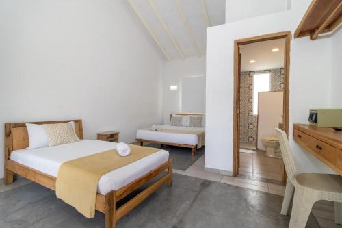 Hotel Sansiraka Suites By GEH Suites - 숙소 외관