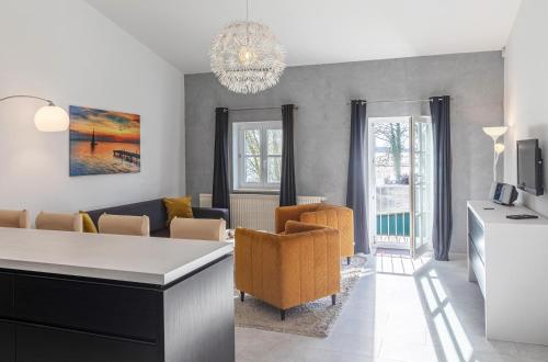 Kietz-Oase - Charmante Ferienwohnung mit Balkon & Müritzblick im historischen Speicher in Waren Müritz, Deutschland
