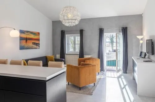 Kietz-Oase - Charmante Ferienwohnung mit Balkon & Müritzblick im historischen Speicher in Waren Müritz, Deutschland