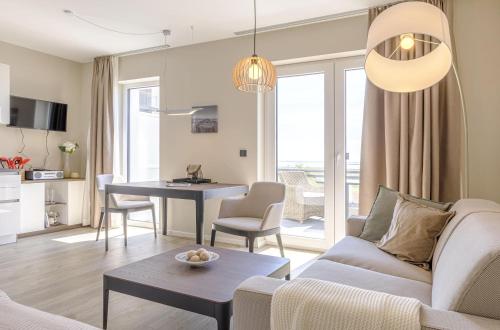 Kleine Strandoase - Ferienwohnung mit Südbalkon, Wellness & Boddenblick in Wustrow, Deutschland