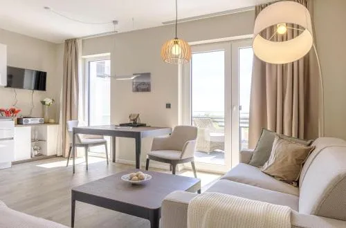 Kleine Strandoase - Ferienwohnung mit Südbalkon, Wellness & Boddenblick in Wustrow, Deutschland