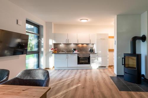 Lotusblume - 5 Sterne Ferienunterkunft mit möblierter Terrasse am Krakower See (Lotusblume - 5 Sterne Ferienunterkunft mit moblierter Terrasse am Krakower See) in Krakow am See