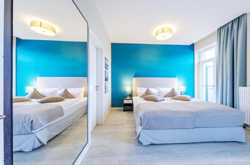 Boddenzeit - Moderne Ferienwohnung mit Nordbalkon, Wellnessbereich und Nähe zum Ostseestrand, Wustrow (zdjęcie 6)