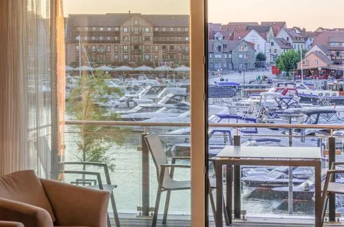 Hafenidylle - Apartment in der Hafenresidenz mit Balkon & Wellness in Waren Müritz, Deutschland