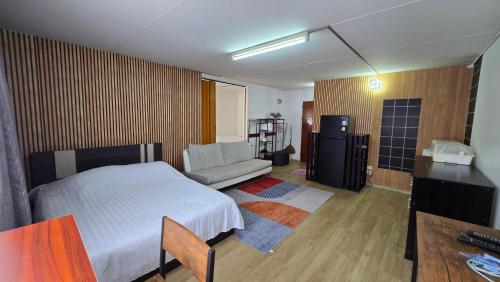 อิมแพ็ค เมืองทองธานี ห้องพักรายวัน Popular Condo T8 Room Type - Family Room with Shared Bathroom