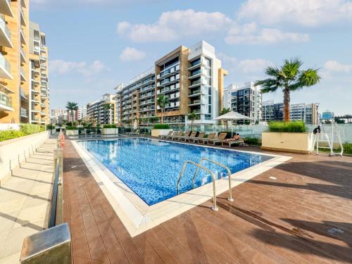 Chic Studio Azizi Riviera Retreat with City Views, Dubai