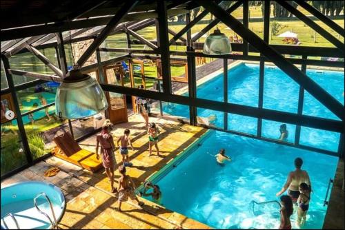 Swimming pool, Hermosa Cabana al Bosque en Bariloche in Lago Gutierrez