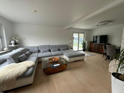 Shared lounge/TV area, Ferienhaus Achterhus fur Familien & Homeoffice in Ratekau