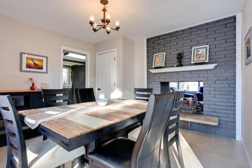Lakefront Hartland Cottage with Patio and Fire Pits! in Hartland, USA