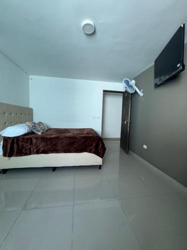 Amplio apartamento en la 70 Estadio Laureles para grupos familiares o amigos, Medellín (fotografie 9)