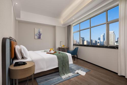 Anya Hotel -Next to Jiefang West Bar Street 2 minutes to the subway station free coffee free laundry free gym, huge windows Anya Hotel -Next to Jiefang West Bar Street 2 minutes to the subway station free coffee free laundry free gym, huge windows