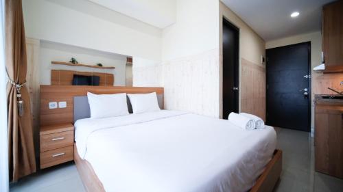 Strategic and Homey Studio at Tamasari Papilio Apartment By Travelio, Surabaya