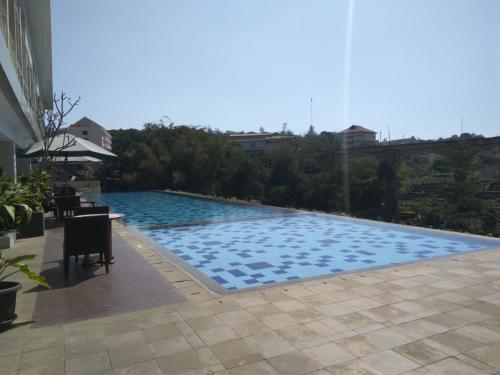 Swimming pool, Cozy Studio @ Taman Melati Jatinangor By Travelio in Cibiru
