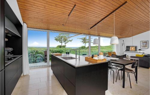 Kitchen, Four-Bedroom Holiday Home In Lundby in Lundby