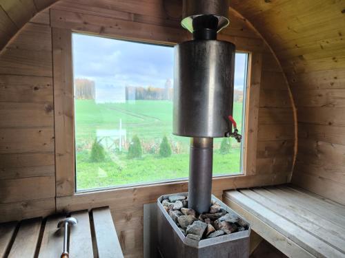 Szauna, Brīvdienu māja Pakavi (Brivdienu maja Pakavi) in Skulte