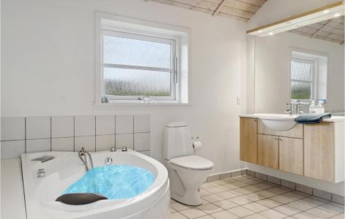 Bathroom, Four-Bedroom Holiday Home In Vaggerlose in Idestrup
