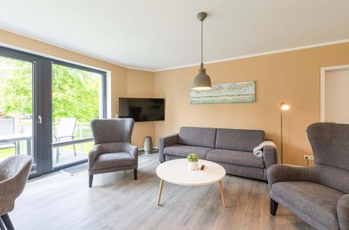 Herr Brummer - Stilvolles 3-Zimmer-Apartment mit Balkon & Sauna in Krakow am See, Deutschland
