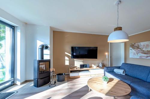 Honigbiene - Stilvolles Apartment mit Balkon, Kamin & Wellness-Flair am Krakower See in Krakow am See, Deutschland