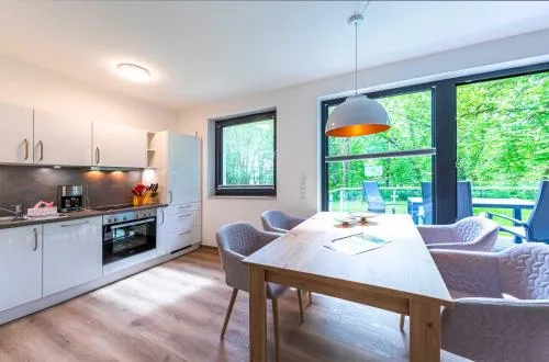 Silberreiher - Modernes Apartment mit Panoramablick, Kamin & Wohlfühlambiente in Krakow am See, Deutschland