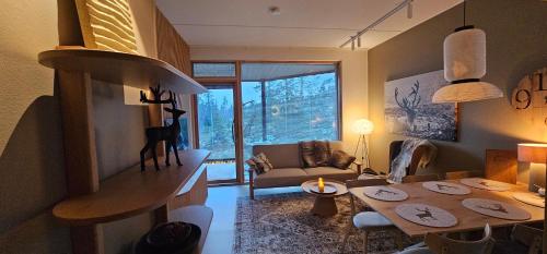 Shared lounge/TV area, Lux Lapland Gielas Utsuvaara Levi in Levi