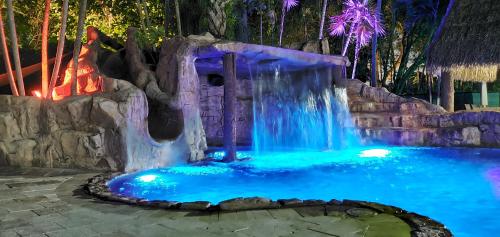 Waterfall Cove- heated pool with slide and waterfall in Miami, USA