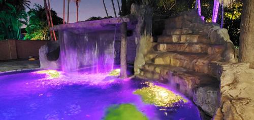 Waterfall Cove- heated pool with slide and waterfall in Miami, USA