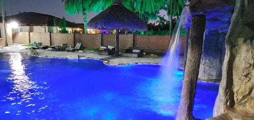 Waterfall Cove- heated pool with slide and waterfall in Miami, USA