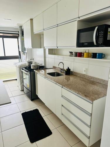 Lindo apartamento beira mar em condominio com piscina near Prainha Beach