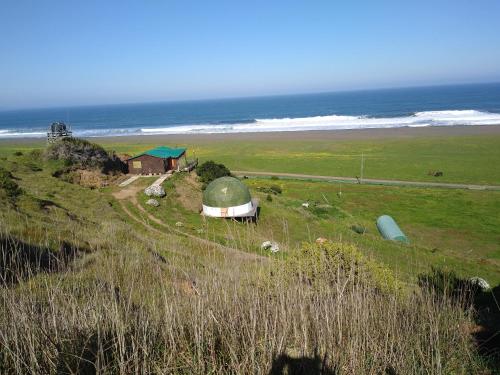 Frente al mar campo y playa