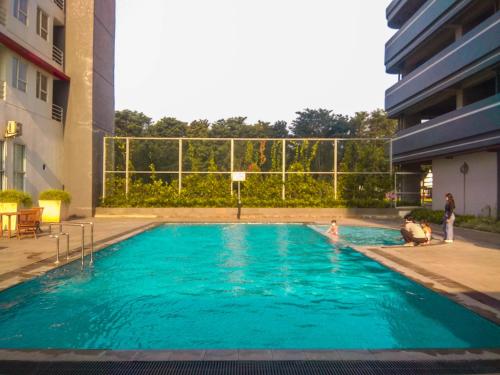 Blue Accent Studio at Elvis Tower Apt By Travelio - Sungai Citarum