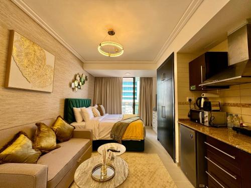 Cosmos Living Sleek and Stylish Studio with Balcony, Dubai