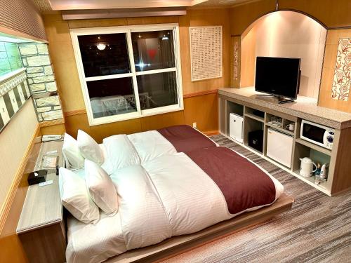富士Outlet温泉Hotel - Tap to explore photos