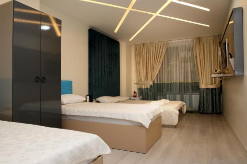 Deluxe Quadruple Room image 3