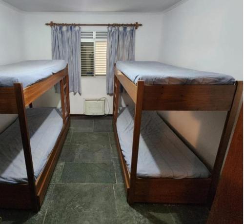 과루자 Pitangueiras prox Praia 10 pessoas ar condicionado 2성급 싱글룸 객실