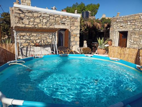 Traditional Creta stone house in serenity village in Arkalochori
