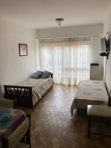 Ambiente céntrico con balcón