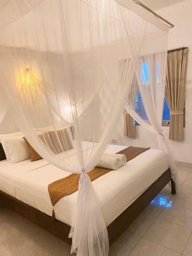 Kubu Mini Guest House - Tap to explore photos