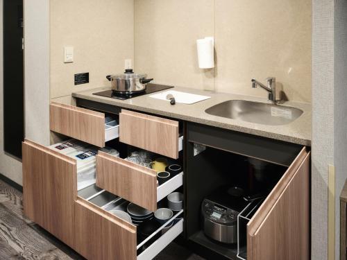 Deluxe Japanese Room with Washing Machine image 9
