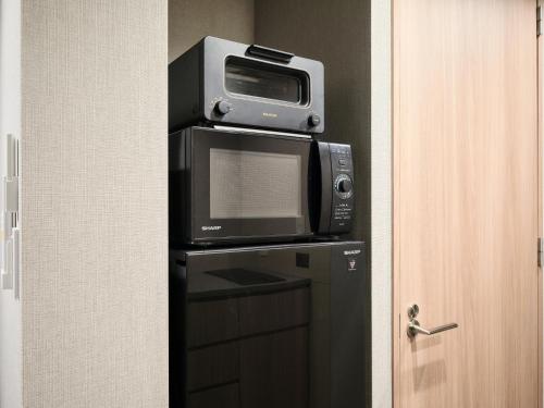 Deluxe Japanese Room with Washing Machine image 8