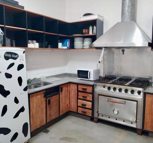 Kitchen, Sabatico Travelers Hostel & Guesthouse near Niño Bien