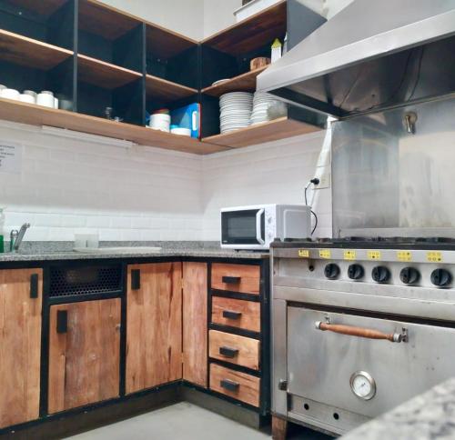 Kitchen, Sabatico Travelers Hostel & Guesthouse near Niño Bien