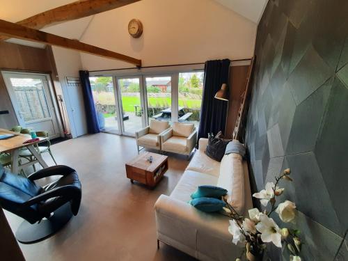 Vakantievilla 10 km van strand honden welkom omheinde tuin sauna buitenbad in Dirkshorn