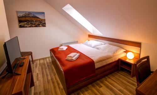 Maisonette Apartment with Balcony and Extra Bed room in Apartmány Tri Studničky