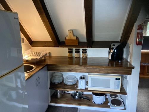 Kitchen, The Chalet Bed and Breakfast-peace and quiet in the country 12 minutes from City in Waitati