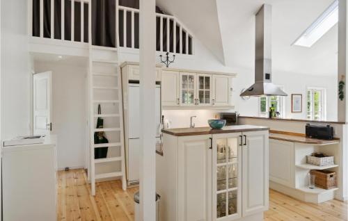 Kitchen, Three-Bedroom Holiday Home In Hojby in Hojby