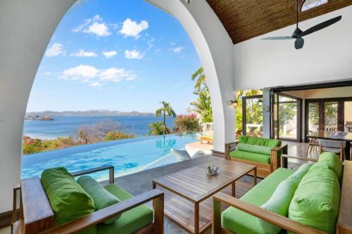 Dreamy Spanish-Style Villa with Sweeping Ocean Views, Elegant Nautical Design & Giant Infinity Pool