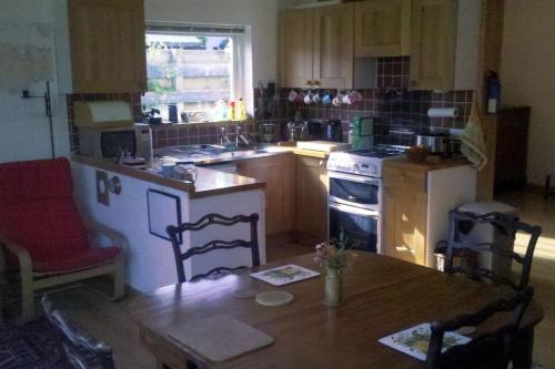 Taigh Sona easy access apartment with double bed in Ullapool