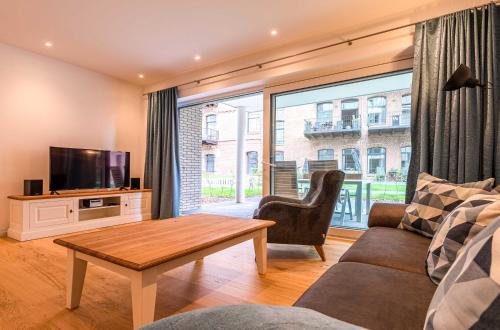 Inselpirat - 5-Sterne Ferienwohnung direkt am See, Malchow