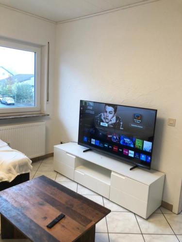 Koplietošanas atpūtas telpa ar TV, Privatwohnung - Busecker Tal in Buseck